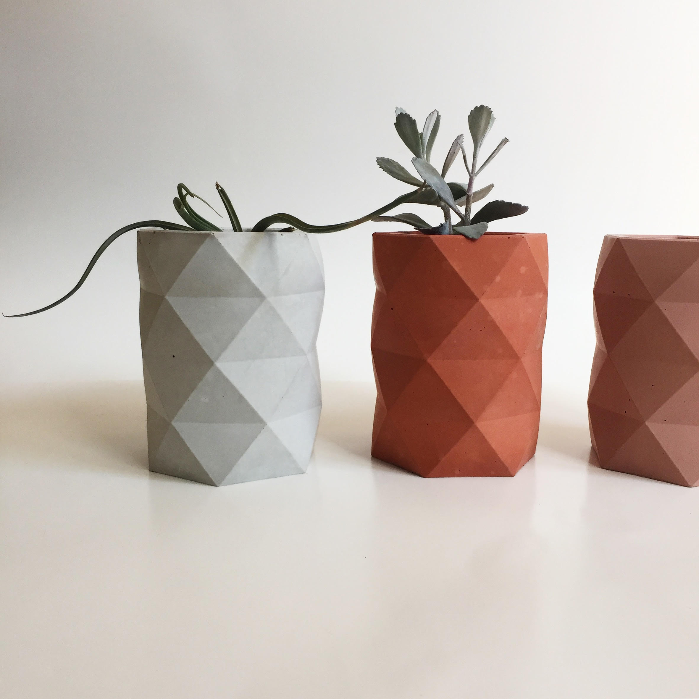 seed and stone angular vessels