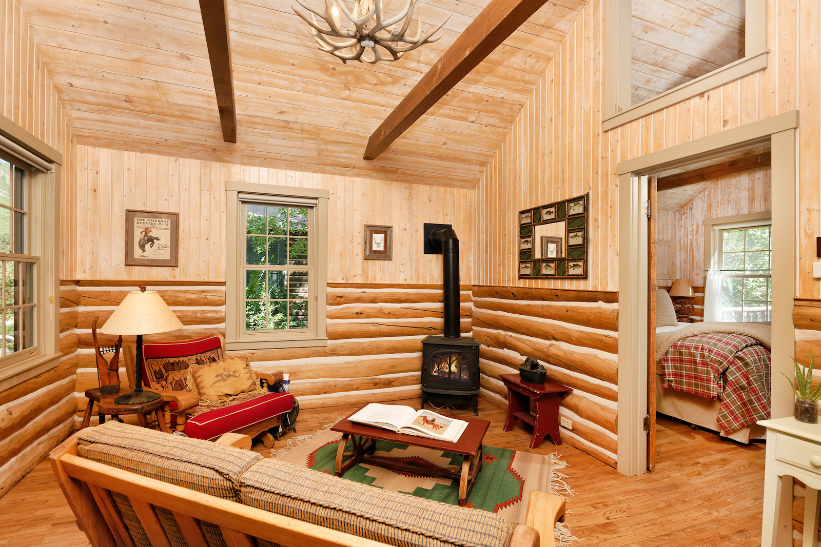 spruce cabin living room Photo courtesy of Coldwell Banker Mason Morse