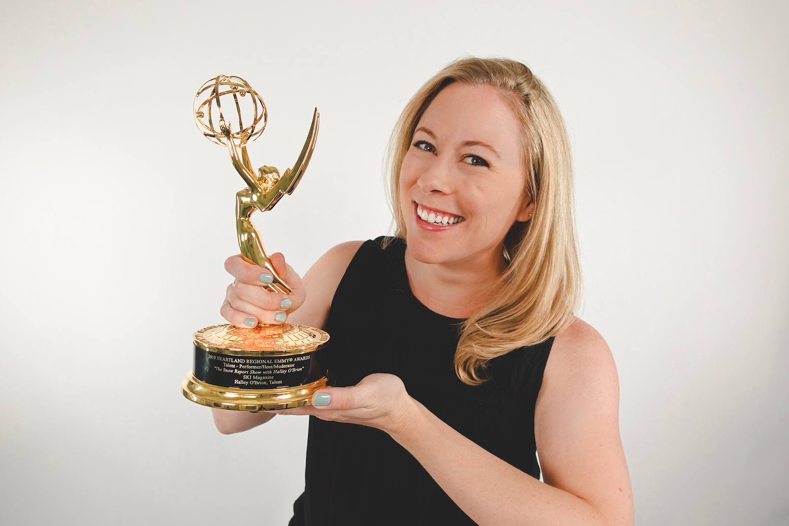 Halley O'Brien Celebrates the Snow Report's Emmy Win