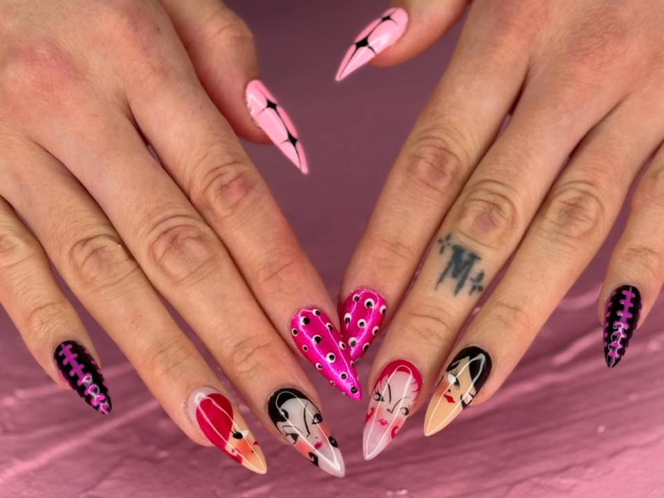 Detailed pink nails with character faces