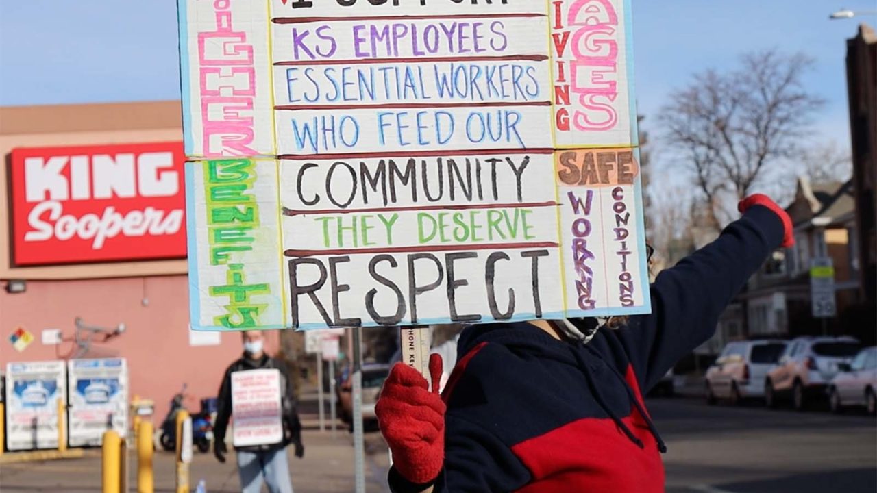 Someone on strike outside King Soopers