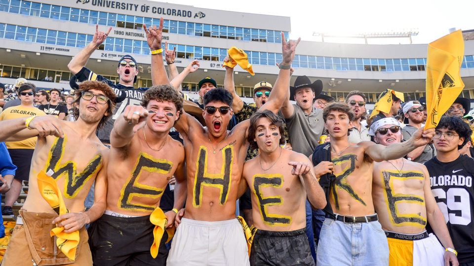 Students at a CU Buffs football game
