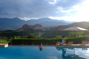 An infinity pool with mountain views