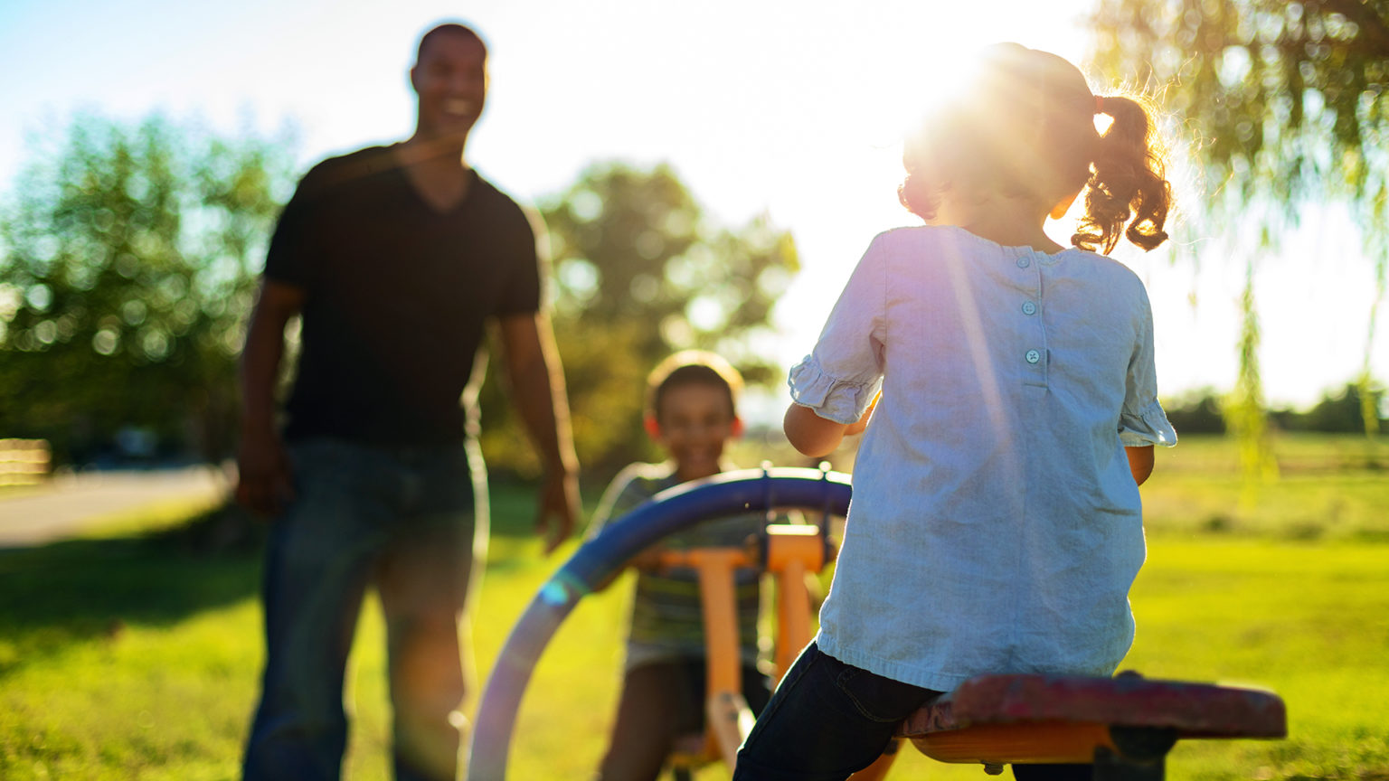 A happy family in sunshine.
