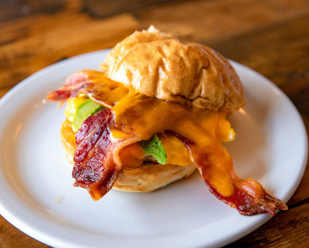 A bacon, egg, cheese, and avocado sandwich at Sunrise Minturn.