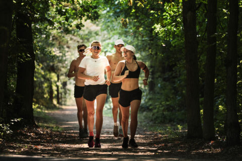 Group of people running on a trail