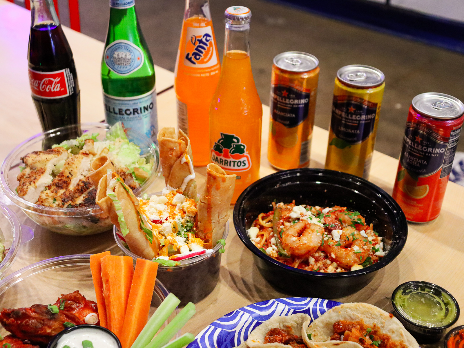 A spread of Italian and Mexican food at Maíz y Fuego.