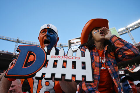Denver Broncos fans cheer on the team