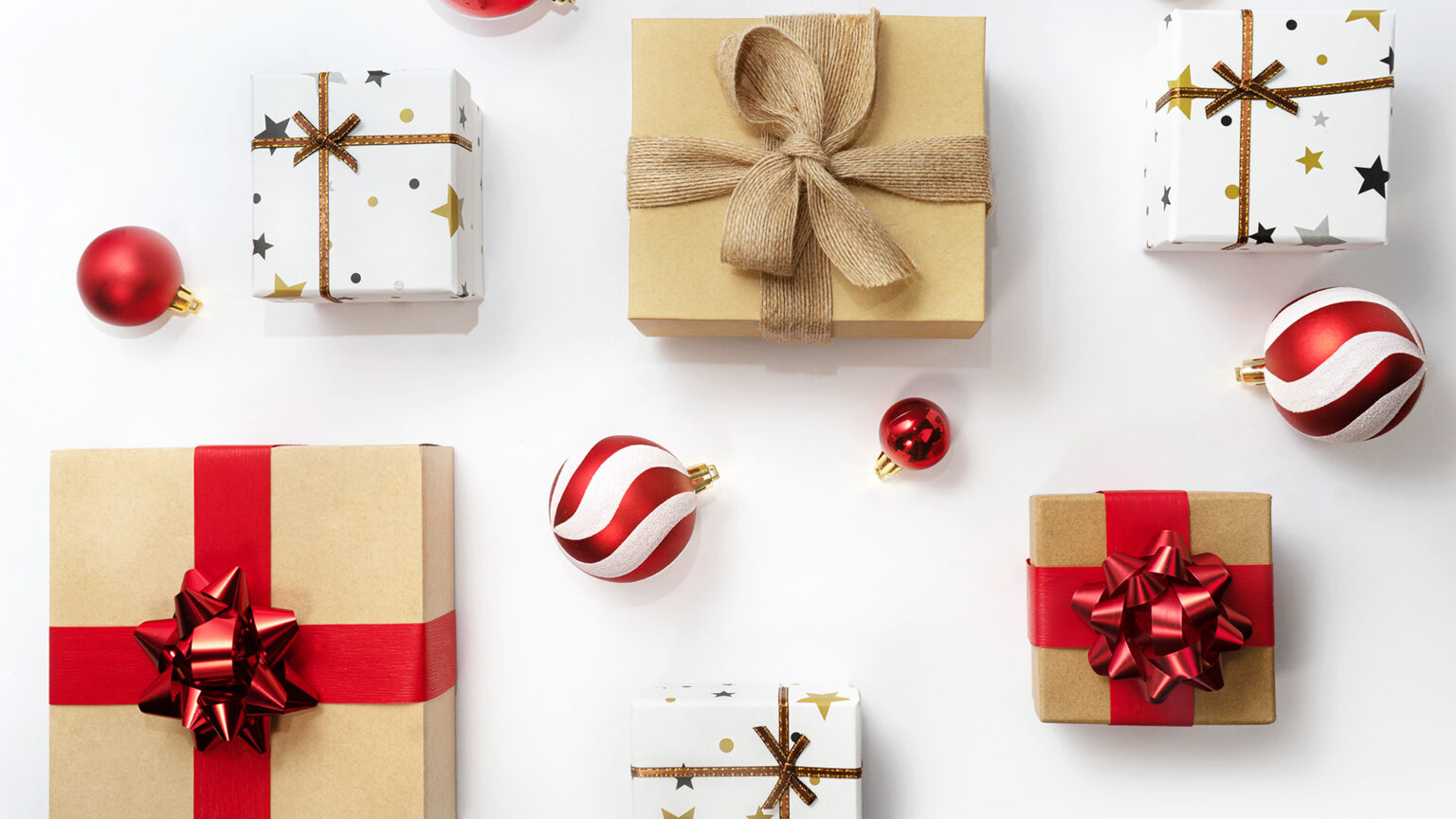 Flatlay of holiday gifts and ornaments