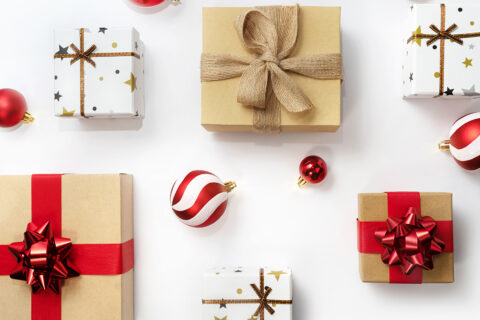 Flatlay of holiday gifts and ornaments