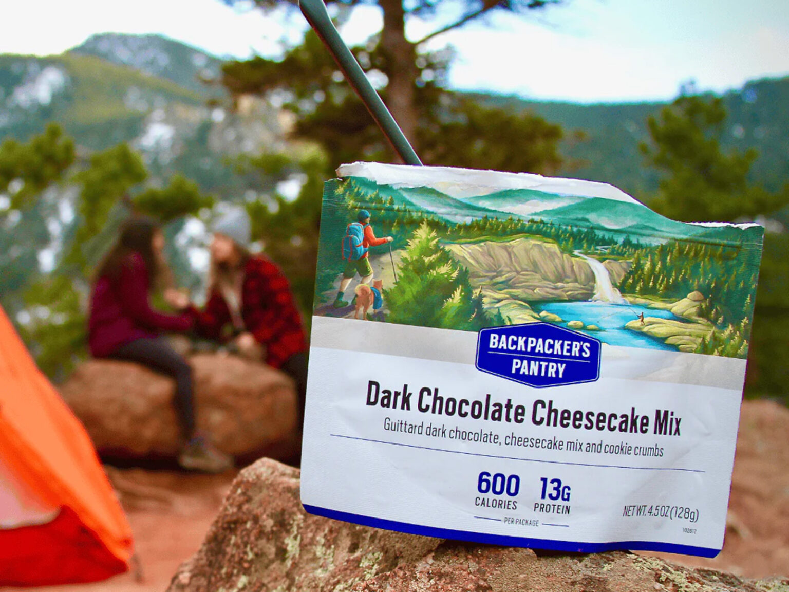 Package of dark chocolate cheesecake mix at a campsite