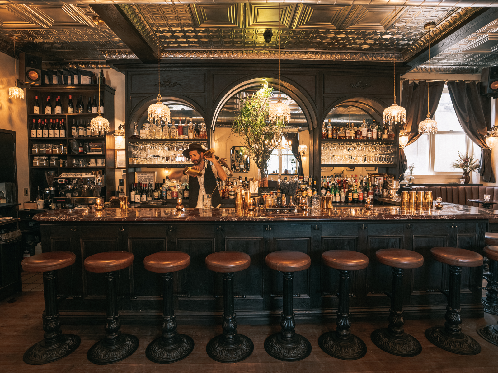 bartendar behind bar 