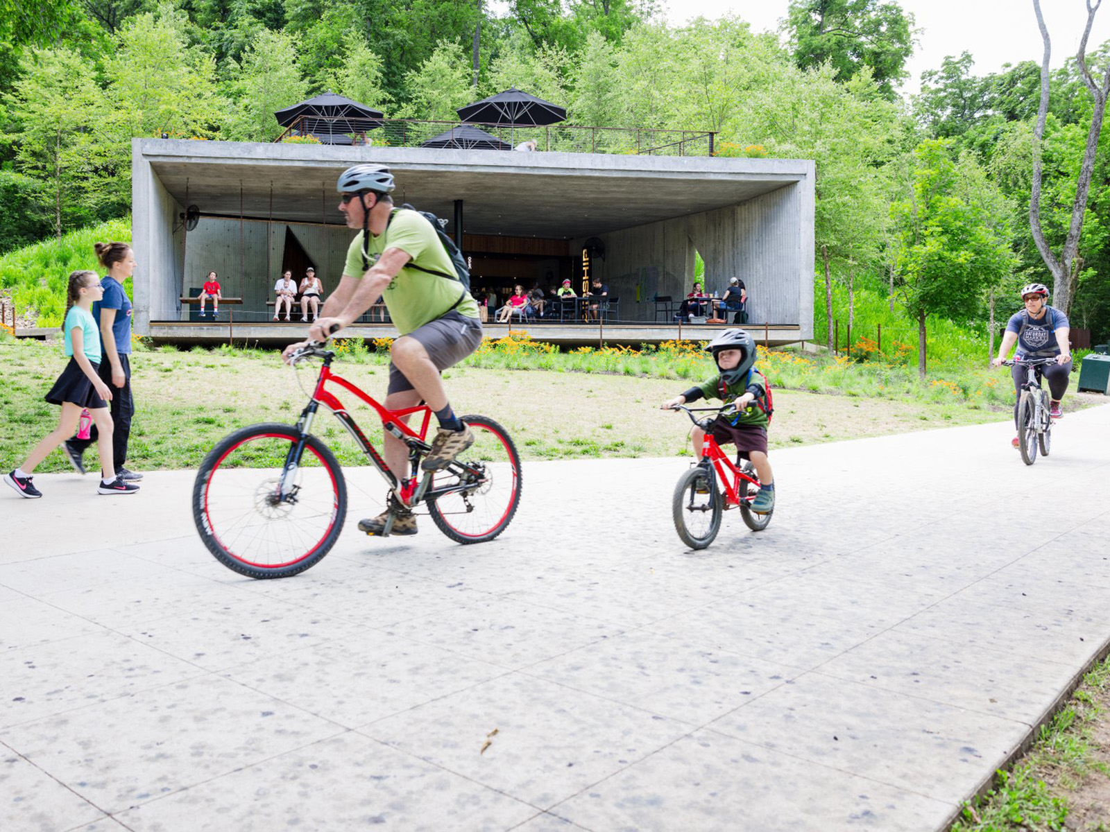 Father and son bike at a mountain biking trail network