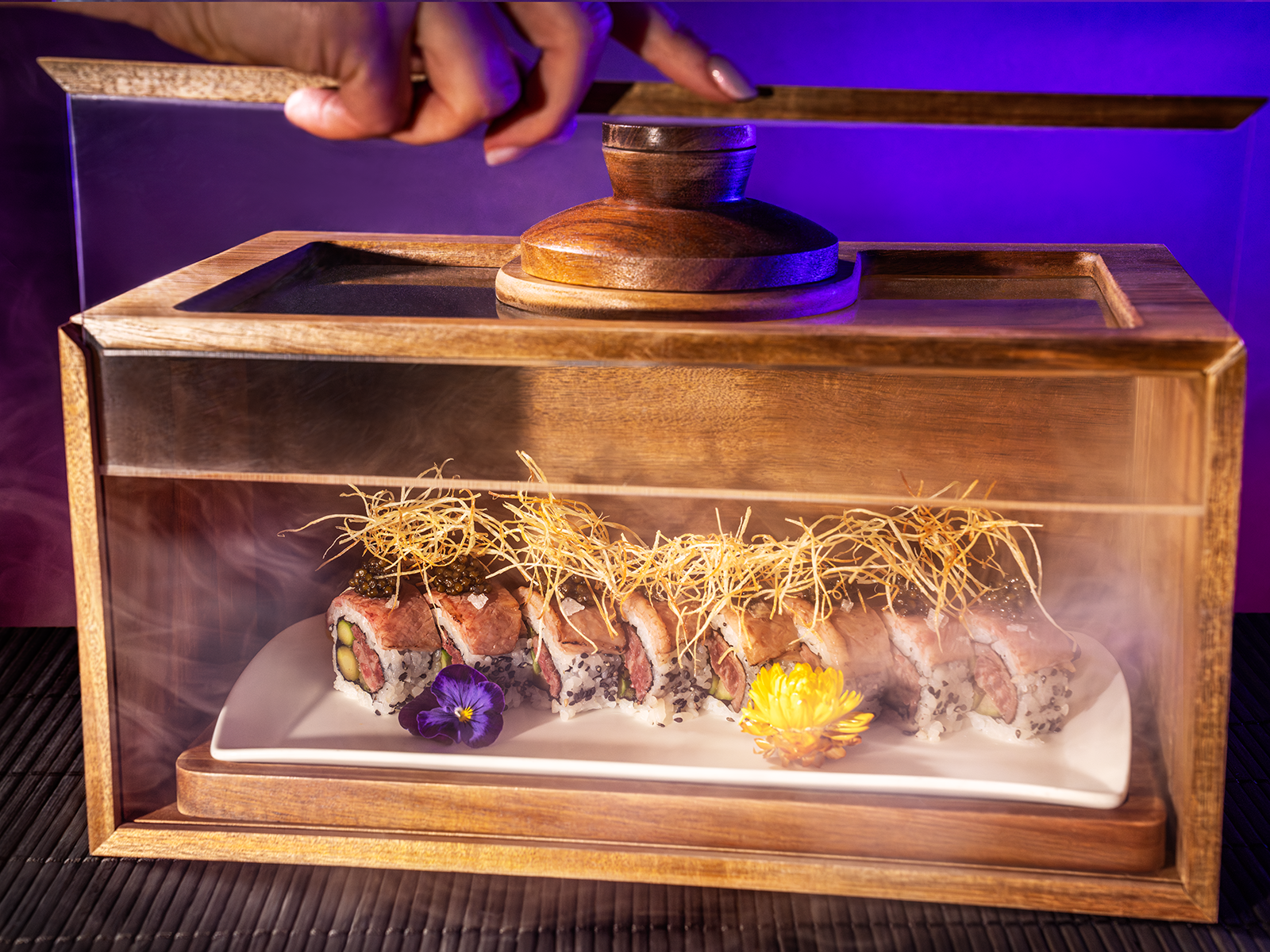 Sushi roll in a wood box