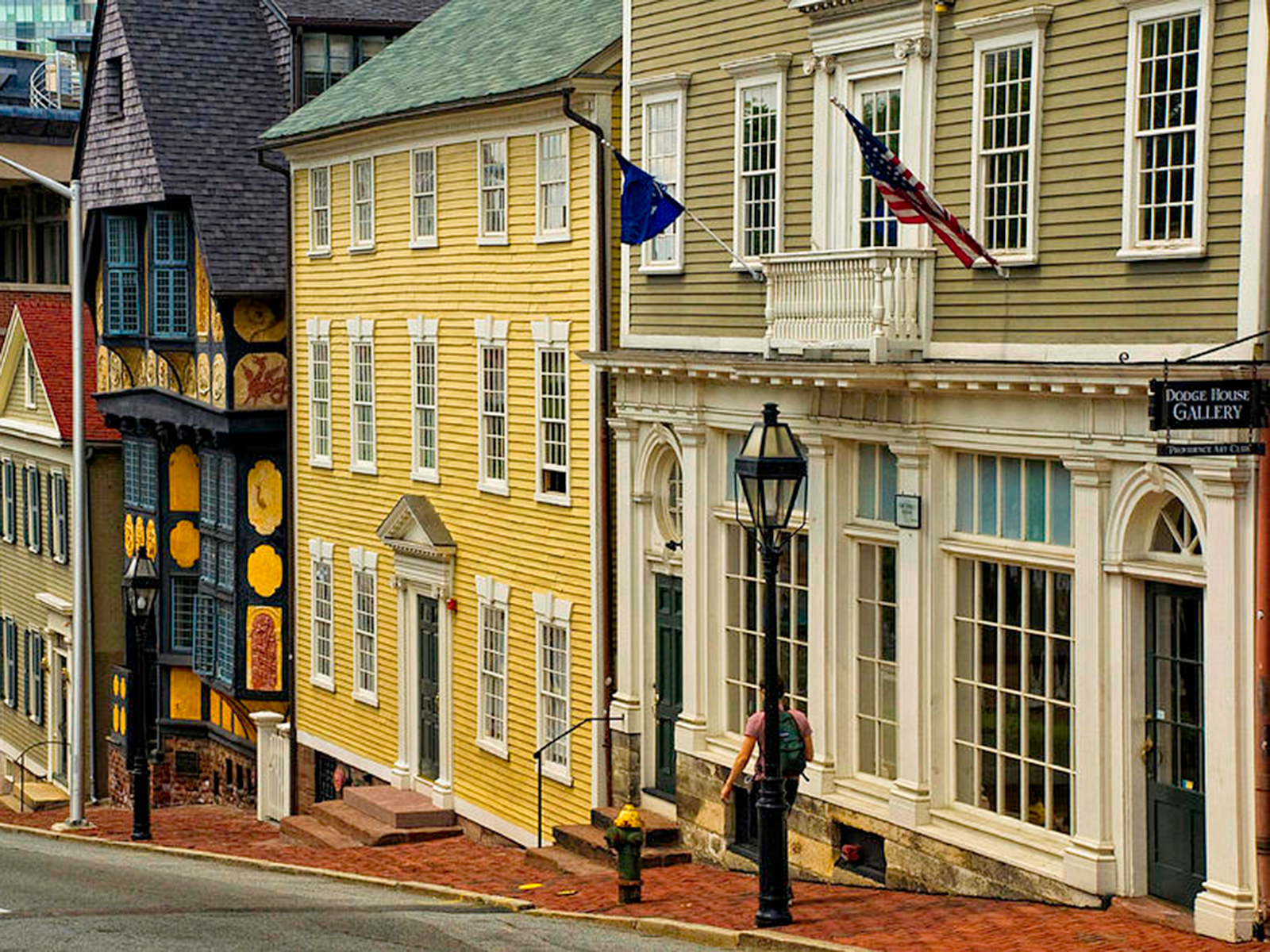 Man walks down a street in Providence, Rhode Island