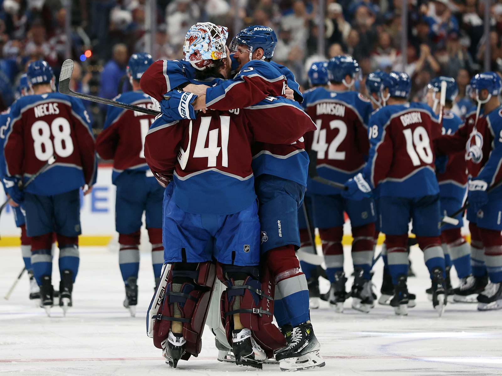 Scott Wedgewood hugging a teammate