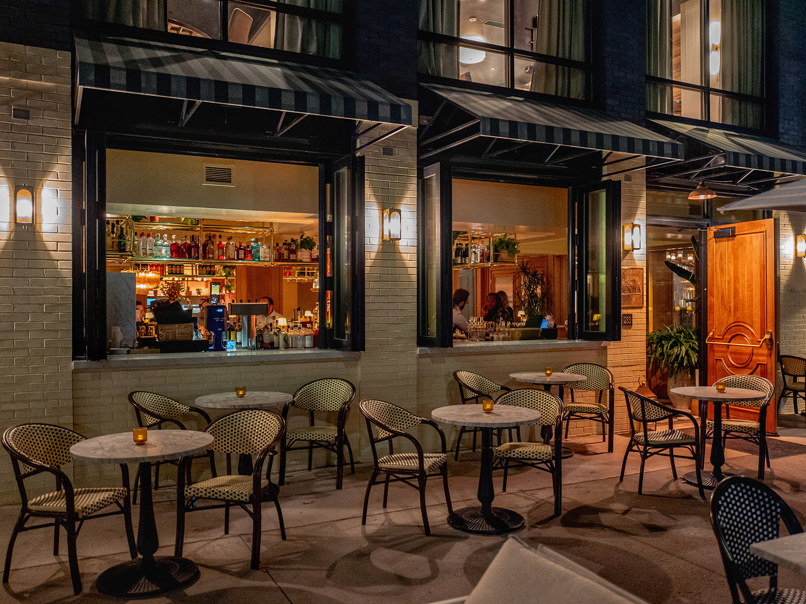 Outdoor patio with black and white chairs