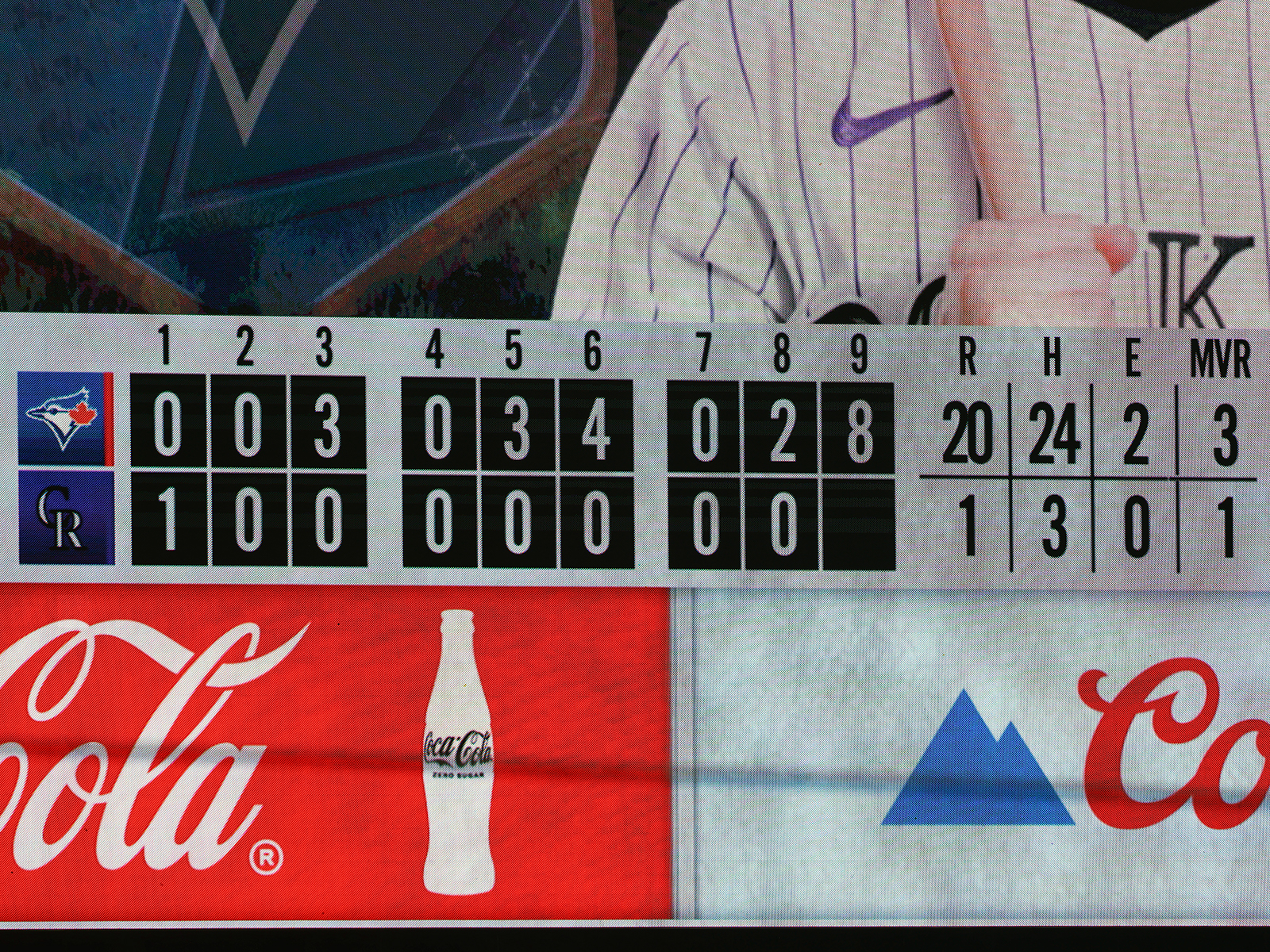The scoreboard shows the Rockies gave up about a bazillion runs and hits to the Blue Jays