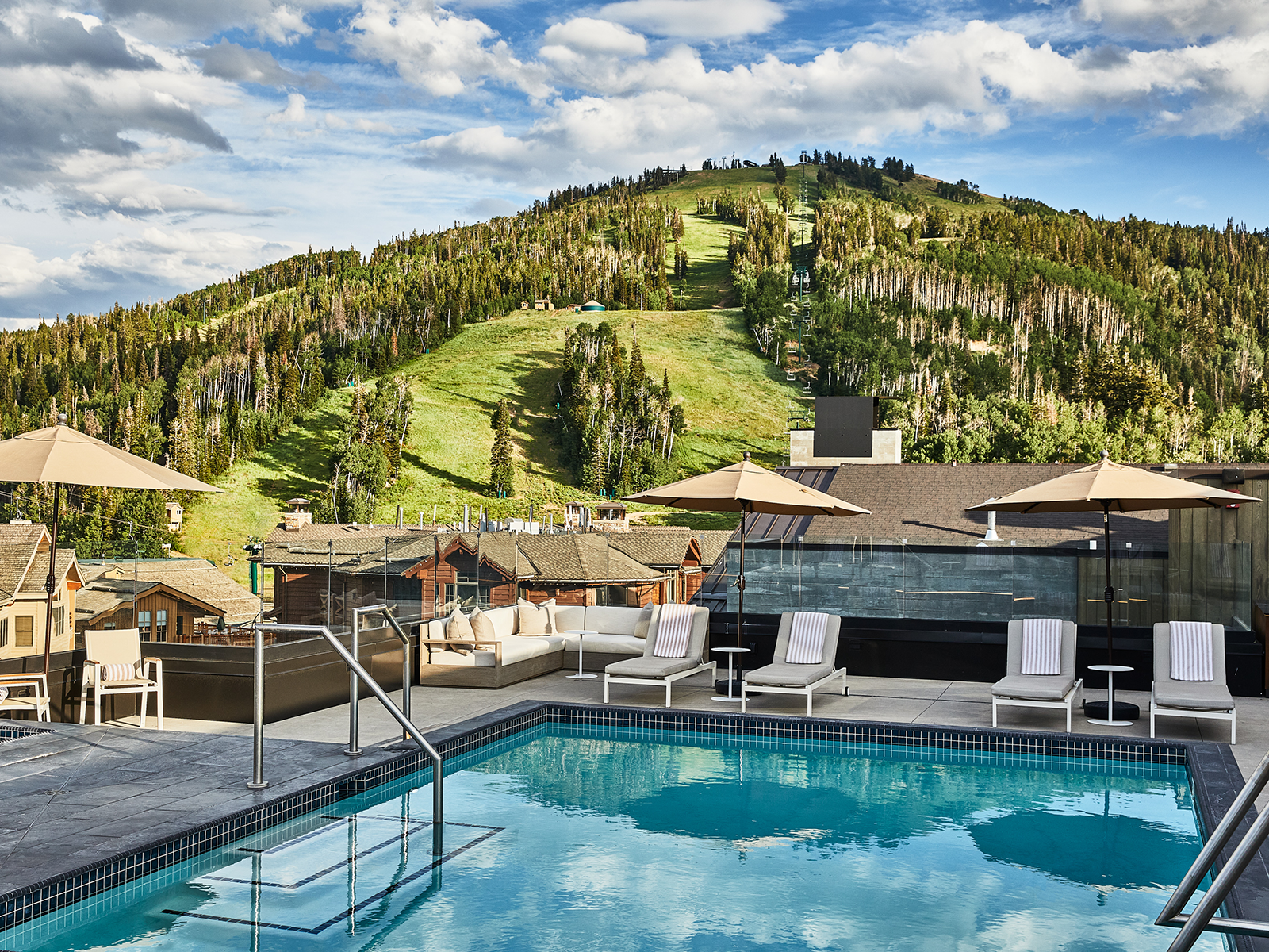 The rooftop pool at the Goldener Hirsch