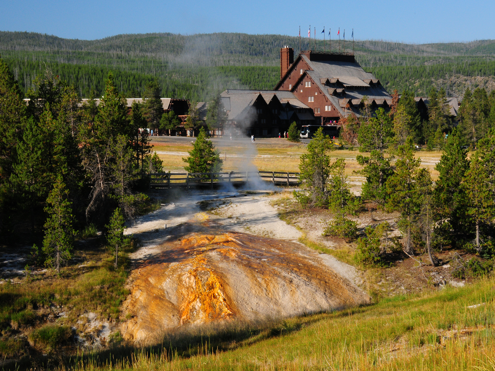 The Old Faithful Inn overlooks the iconic geyser.