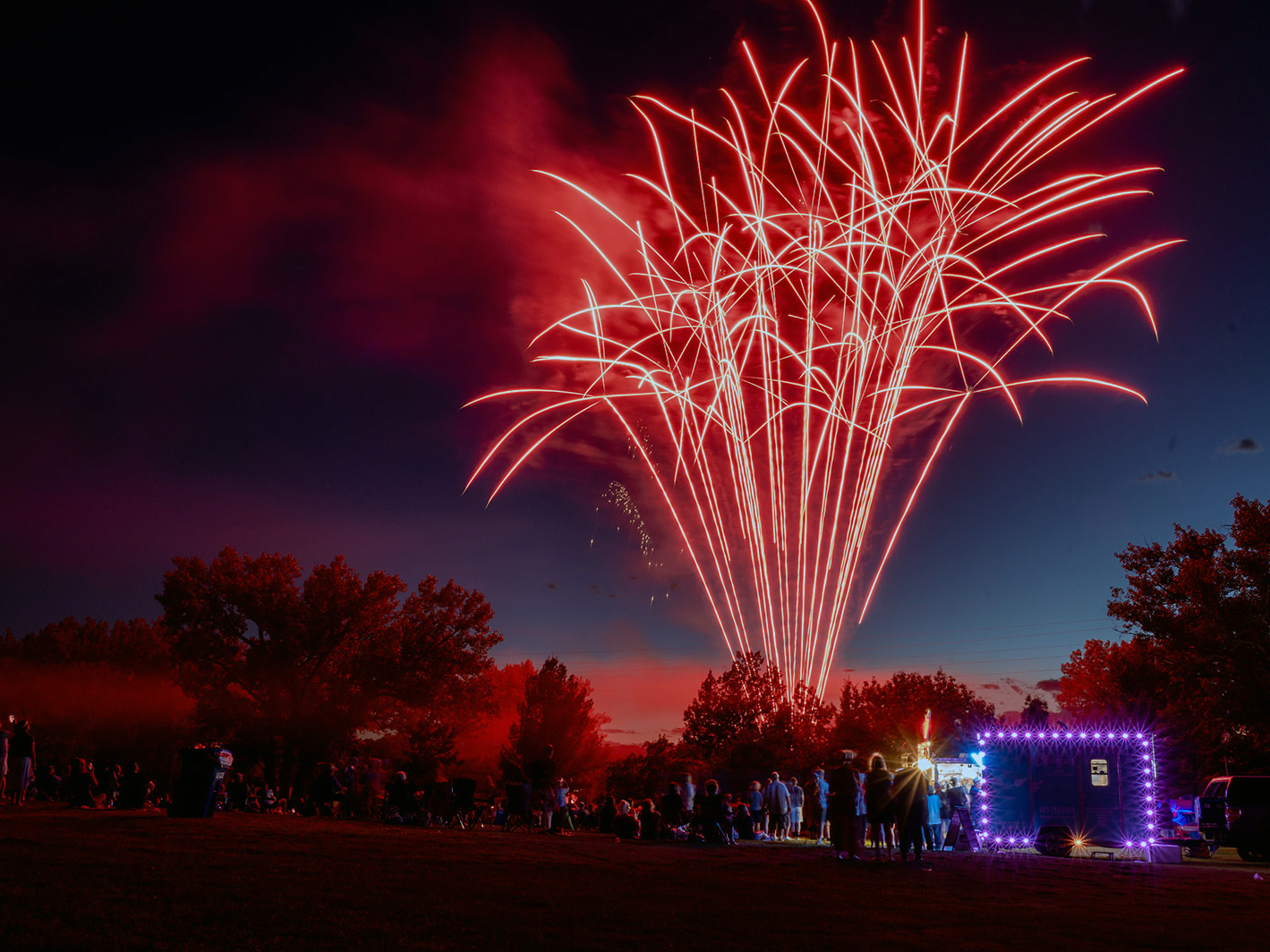 Red fireworks on the Fourth of July in Littleton