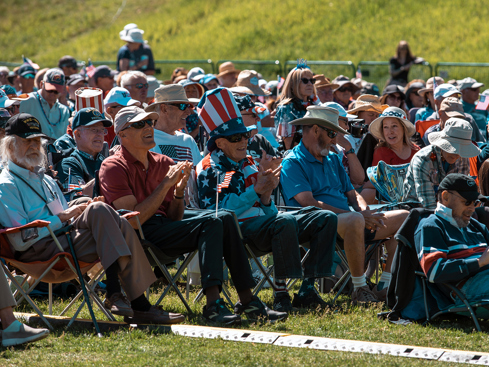 People watching Fourth of July festivities in Rainbow Park in Silverthorne