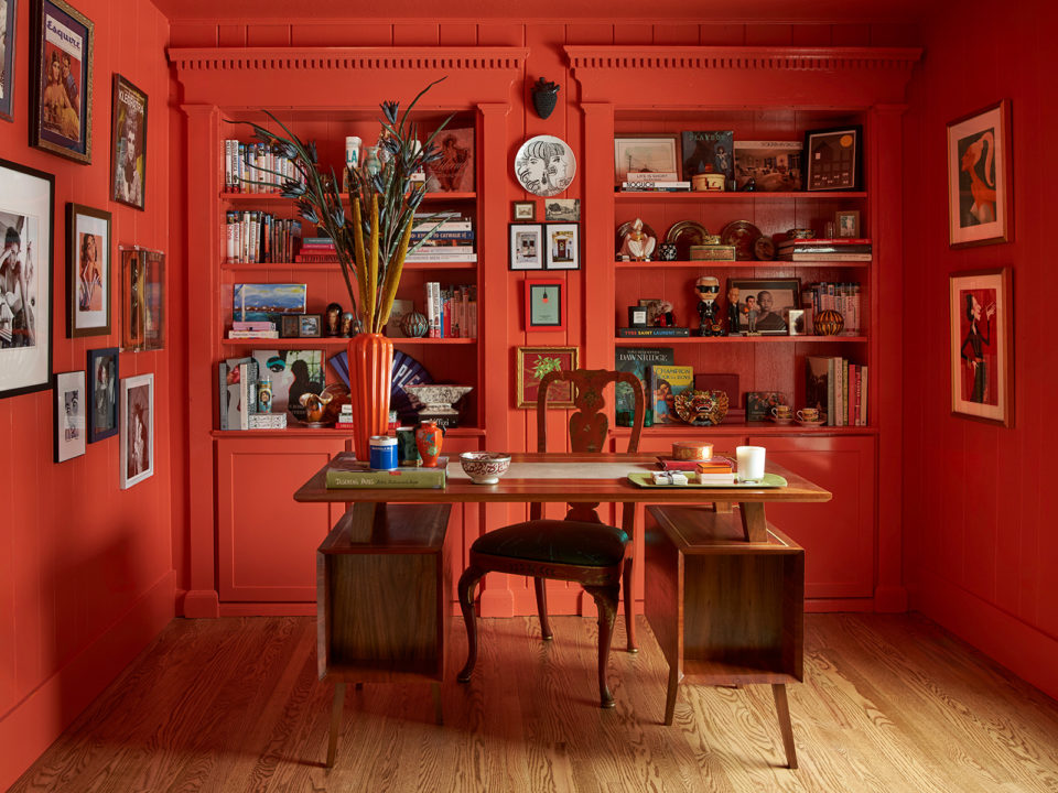 Orange office with wooden desk
