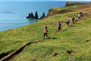 Women run in a single-file line in Iceland