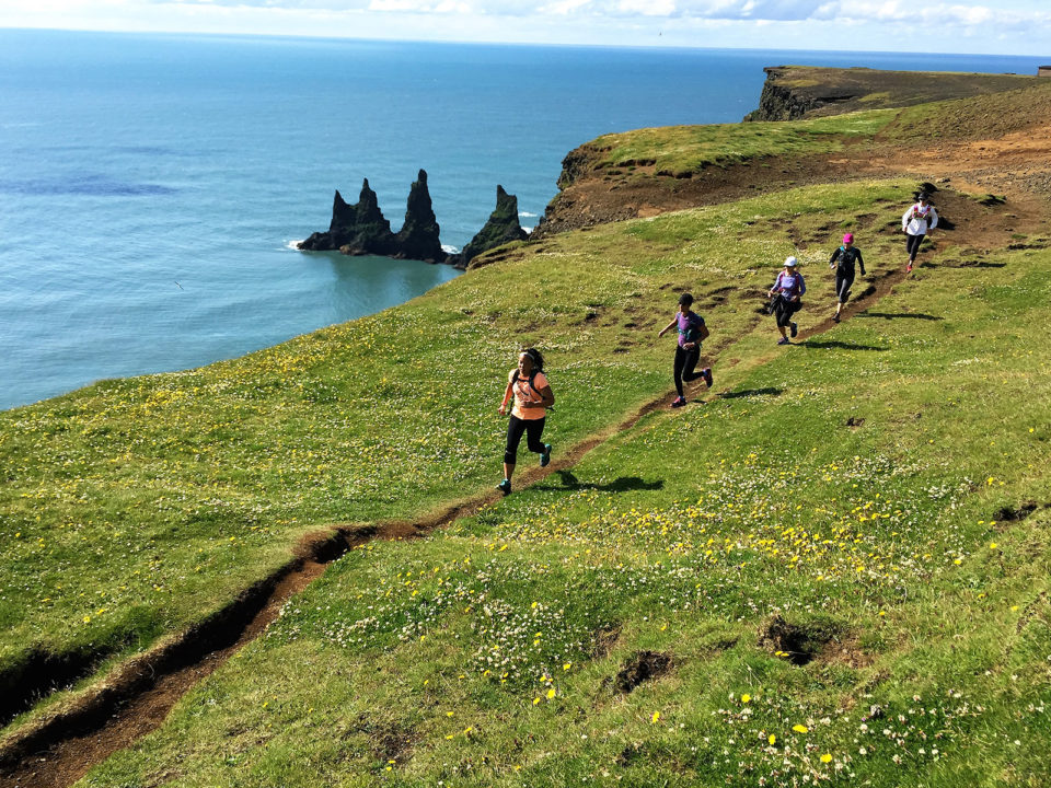 Women run in a single-file line in Iceland