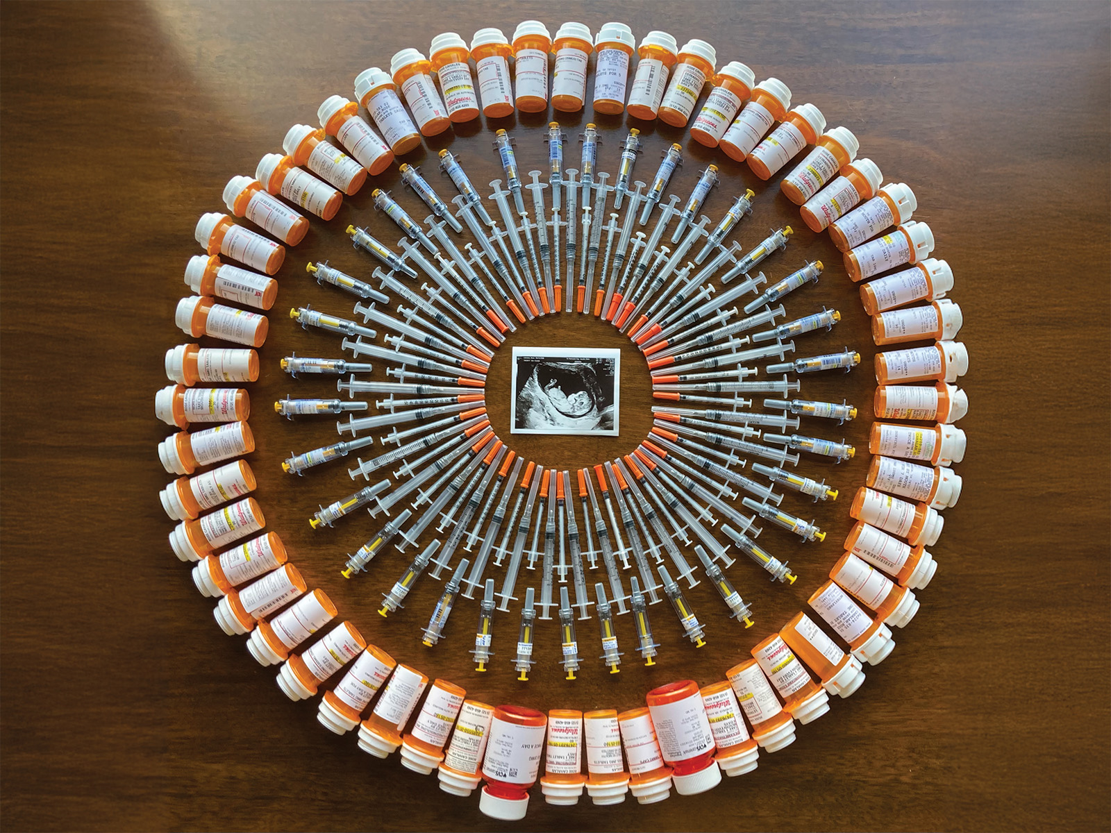 Pill bottles and syringes in a wheel