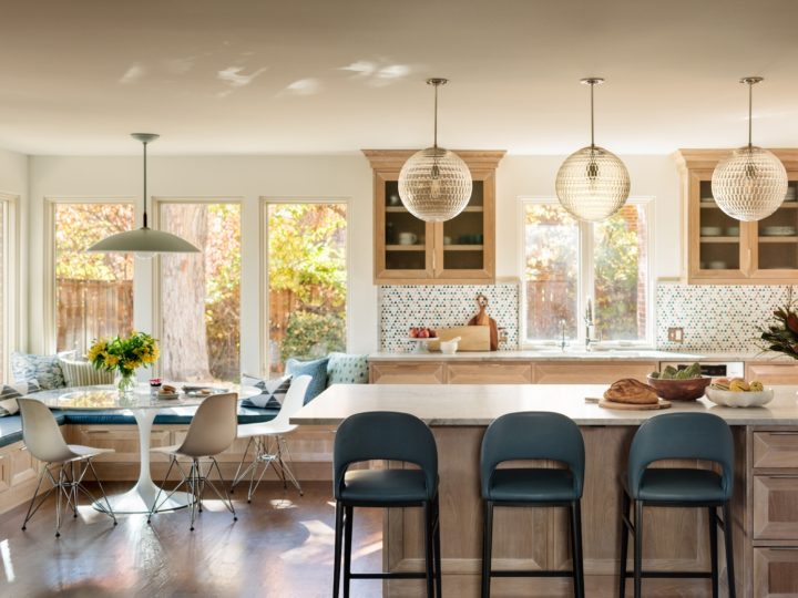 kitchen with light-wood cabinetry and breakfast nook