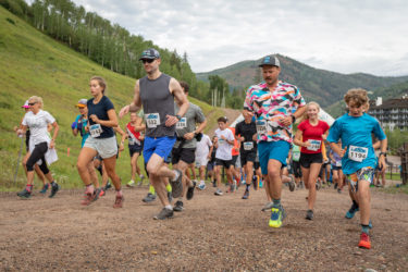 A bunch of trail runners on a Vail trail