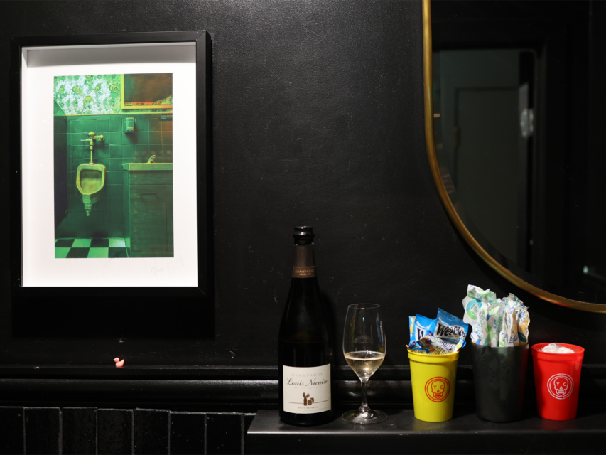 Yacht Club’s framed photograph of a urinal from local author Brian Fouhy’s book Occupied