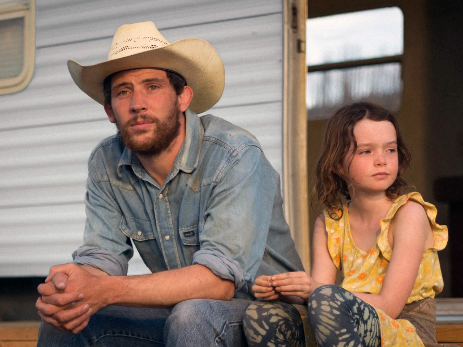 A screen grab of a man and his daughter from the film “Rebuilding”