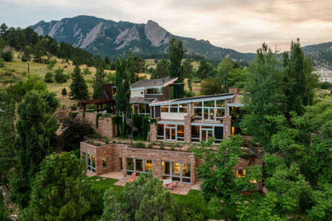 Multistory home built into the side of Boulder's Flatirons