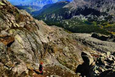 A Vail Mountain Rescue volunteer searches Mt. of the Holy Cross