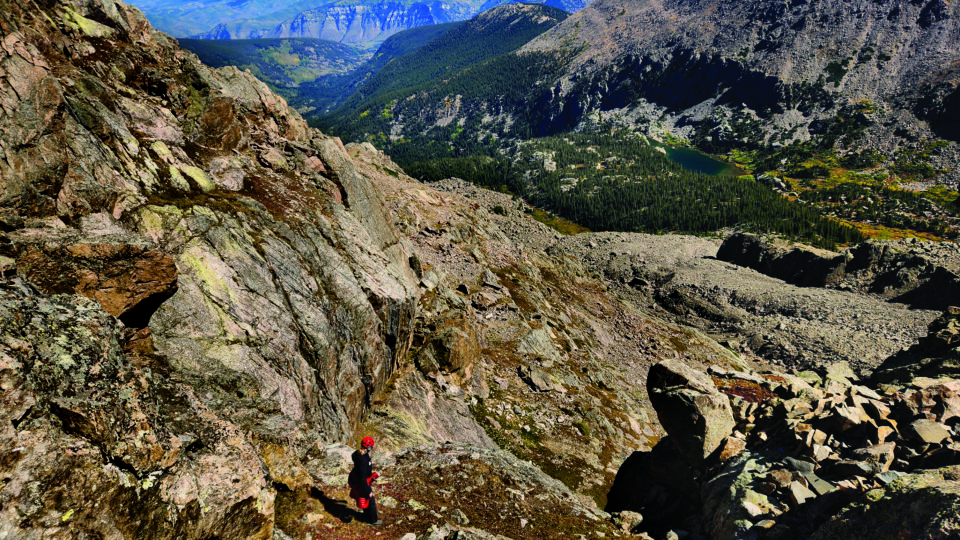 A Vail Mountain Rescue volunteer searches Mt. of the Holy Cross