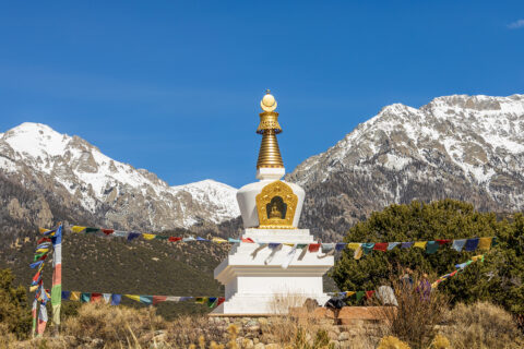 A stupa in front of the Sangre de Cristo mountains