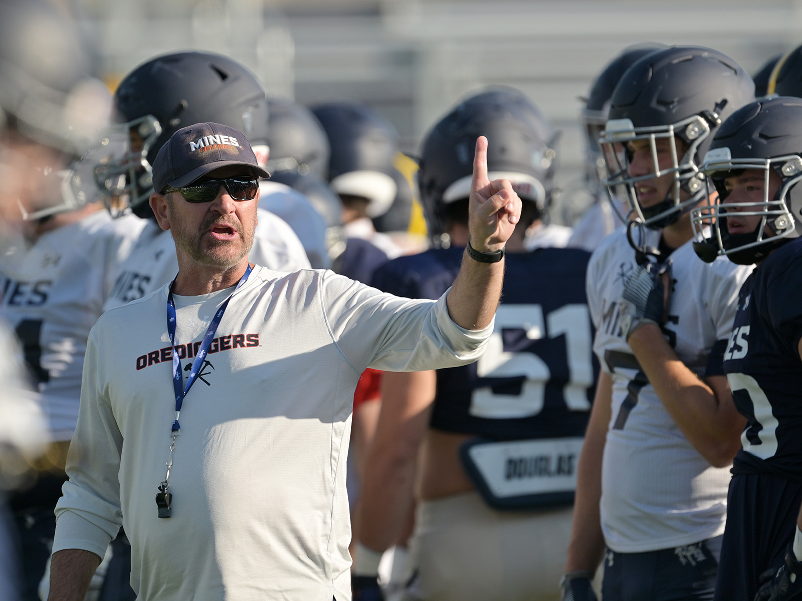 Bob Stitt coaching School of Mines players