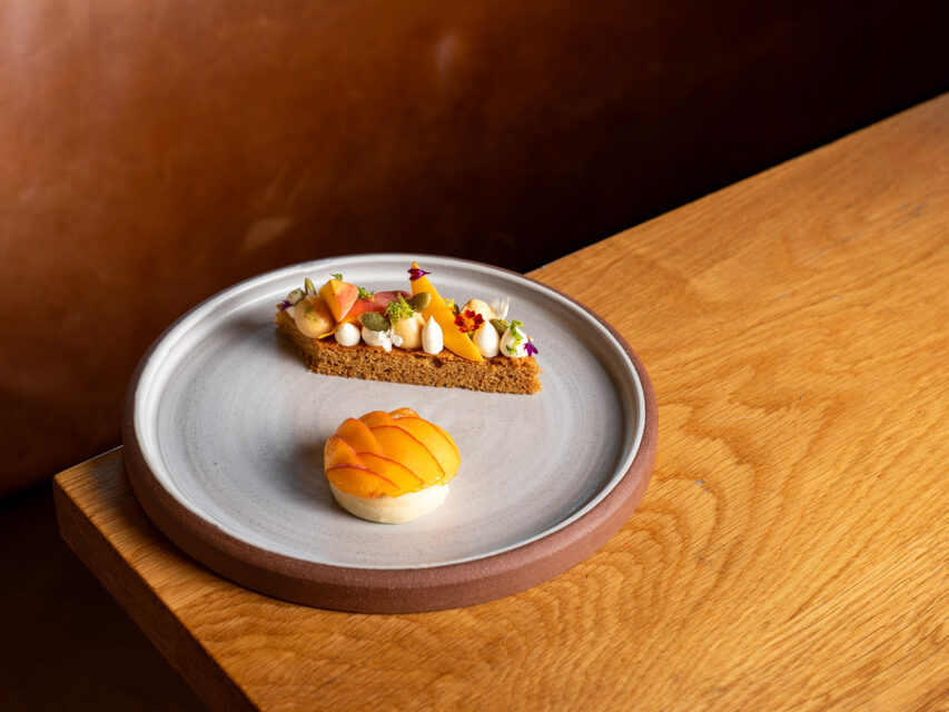 A plate with a tart and bread
