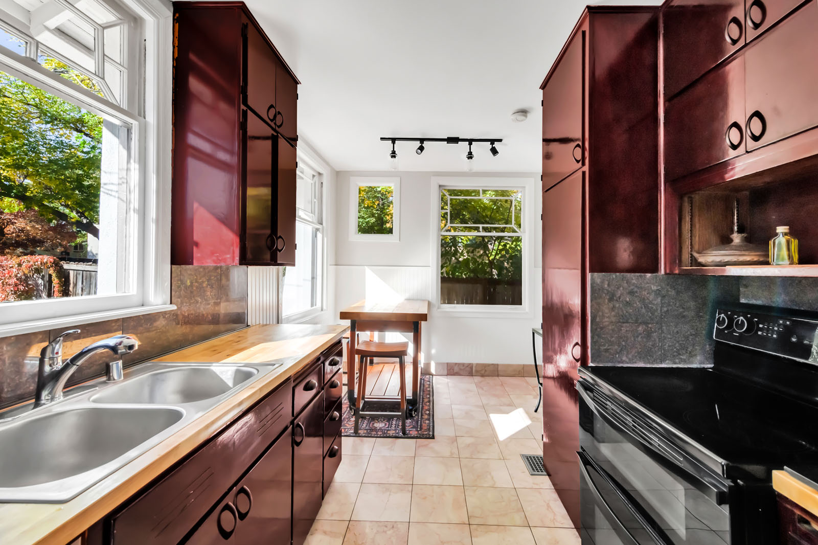 Kitchen with dark wood cabinets