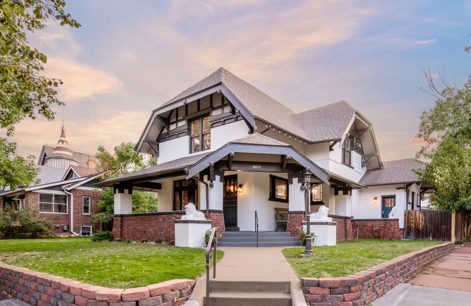 The facade of a two-story craftsman bungalow