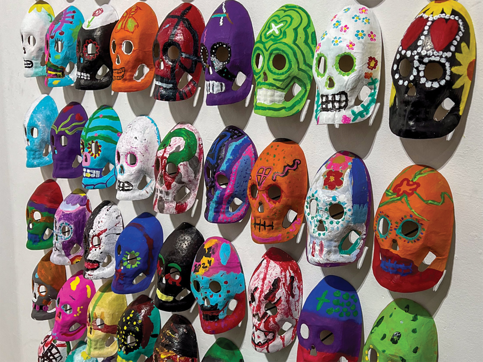Colorful masks on a wall