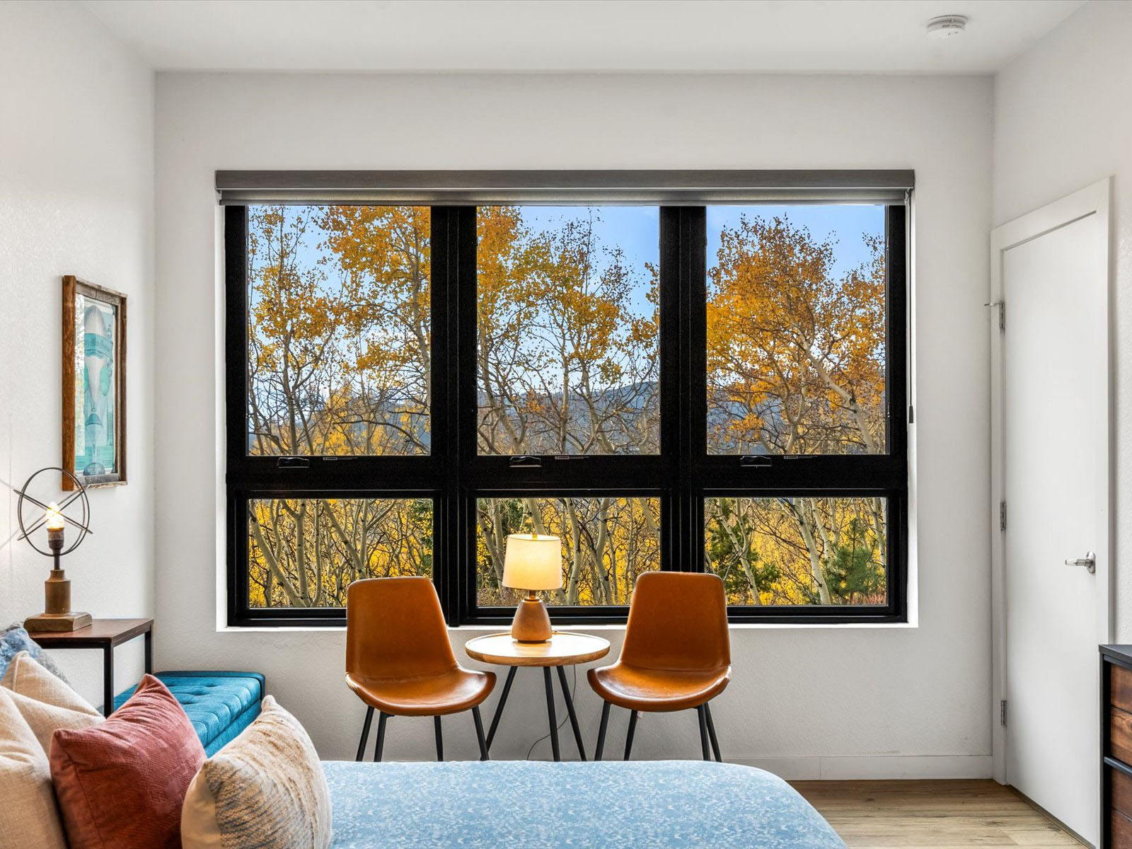 Seating area in front of large windows