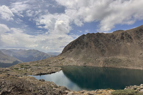 Chihuahua Lake under blue, cloudy skies