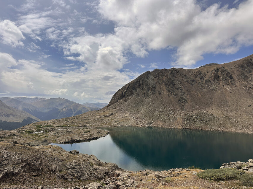 Chihuahua Lake under blue, cloudy skies