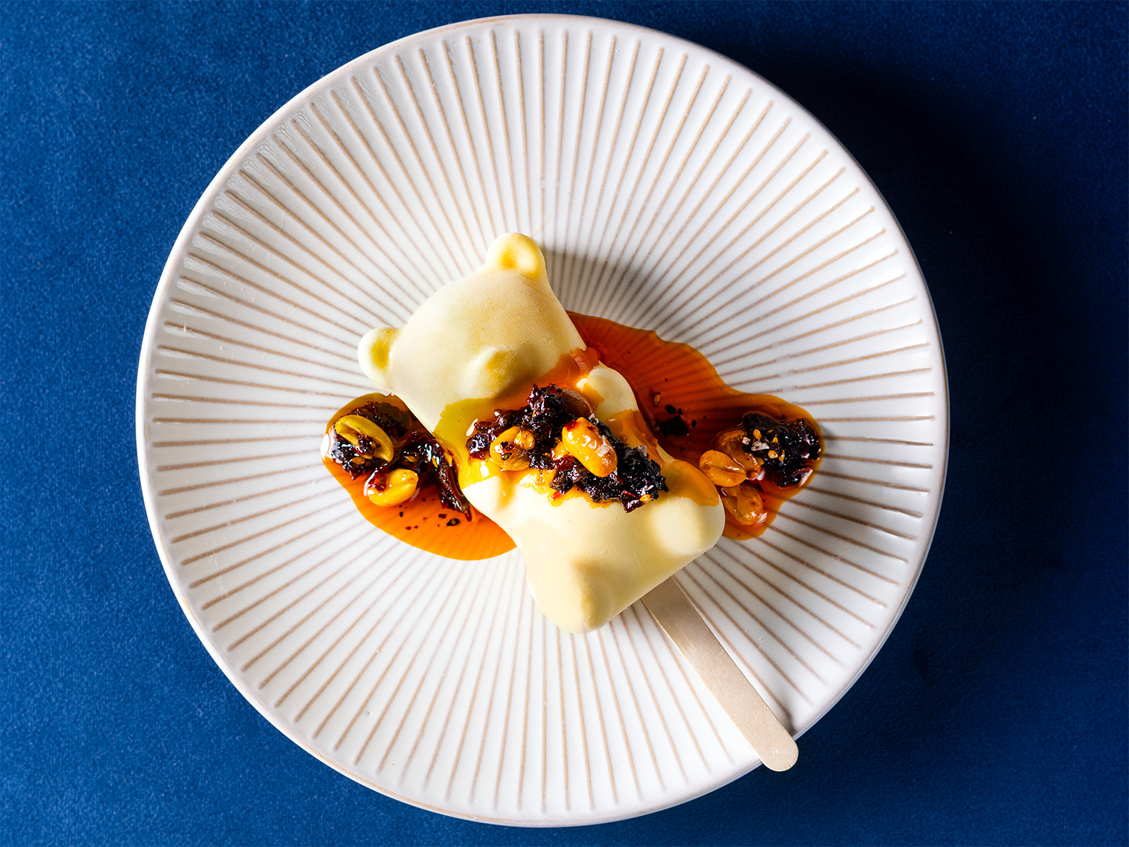 A bear-shaped butter on a stick