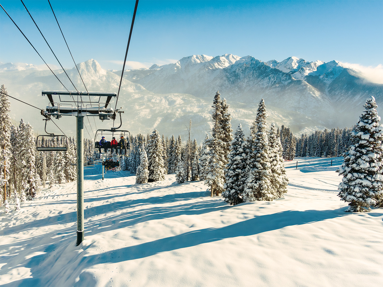 Riding a lift at Powderhorn Mountain Resort in Colorado