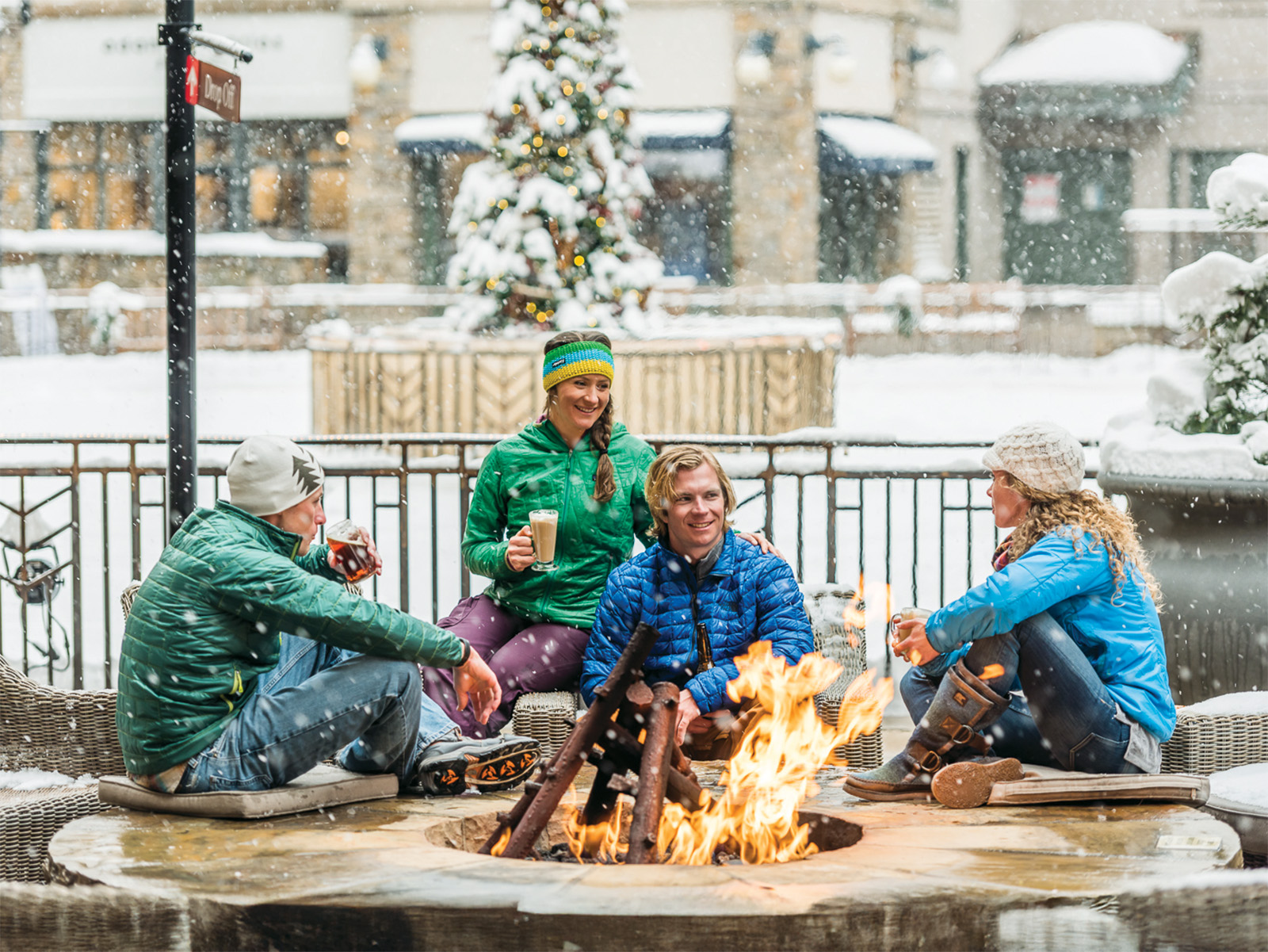Four people enjoying après at Telluride Ski Resort in Colorado