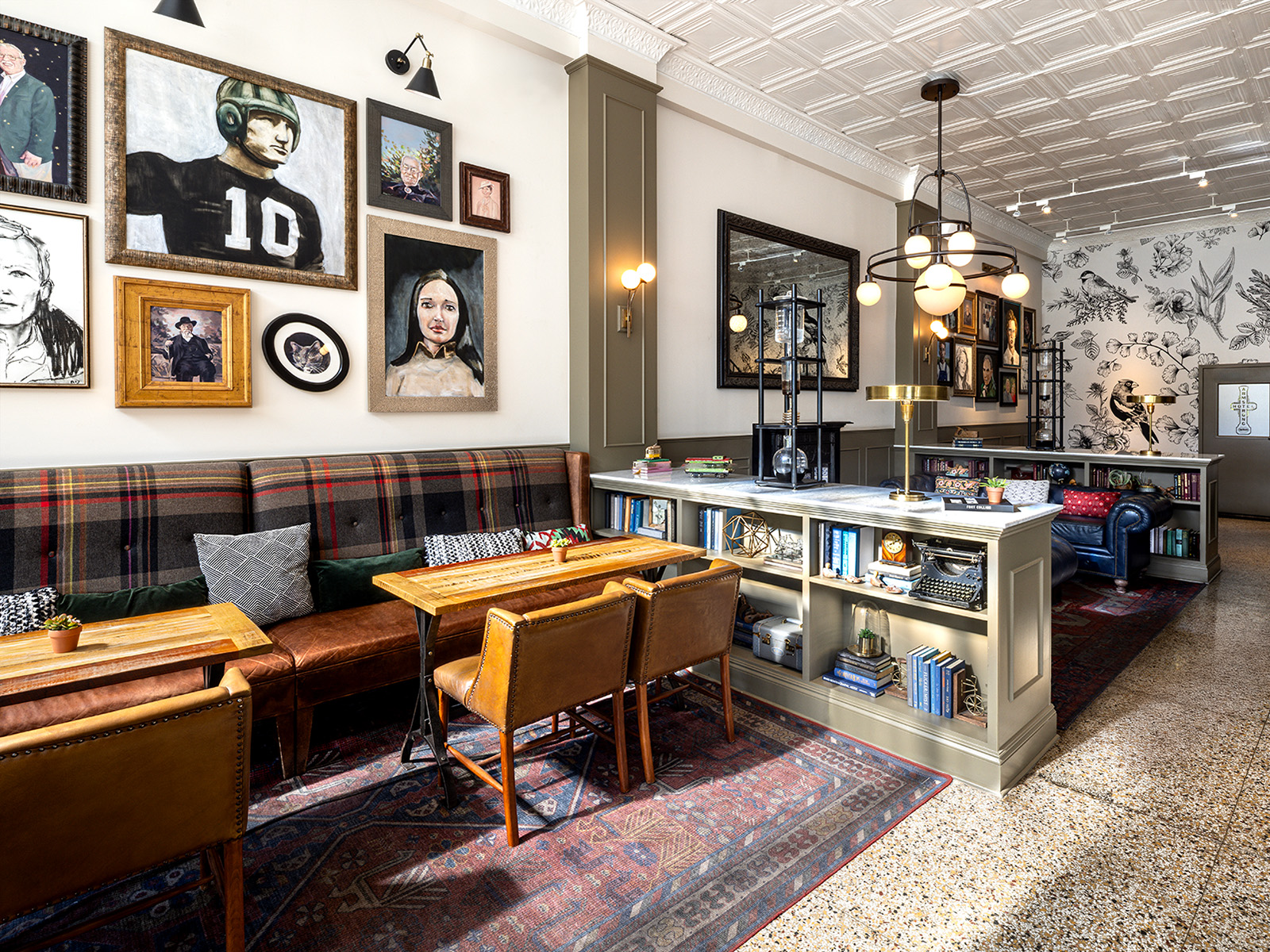 Hotel lobby with flannel booth and a portrait gallery